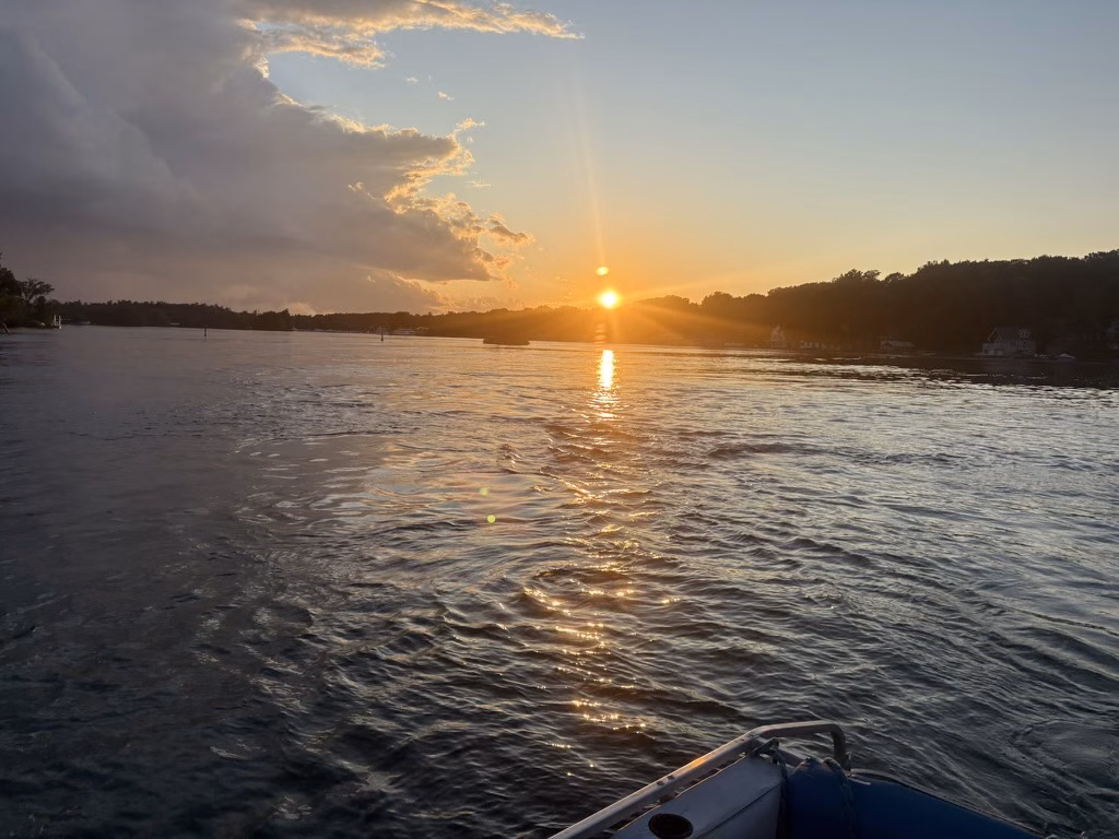 Sunset across the river during the boat crossing